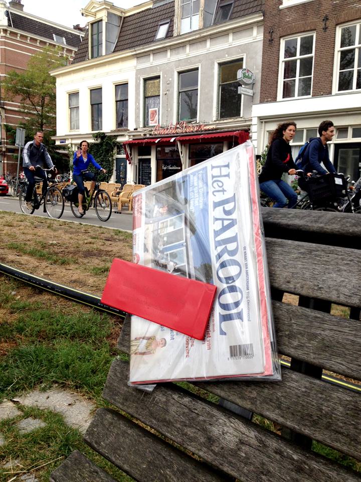 Ruilbank_Morning newspaper at public benches Amsterdam