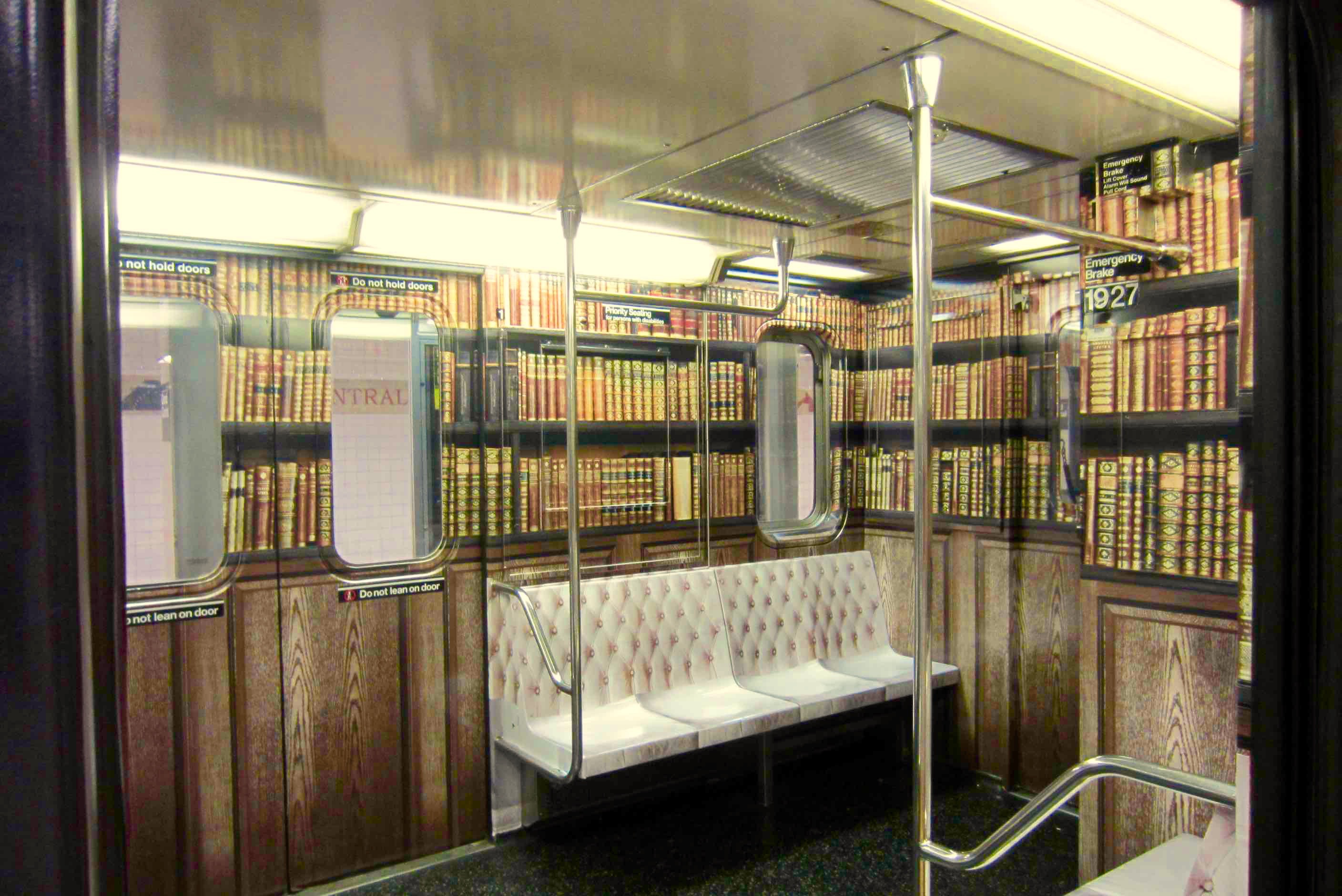A subway carriage has been decorated to look like a library