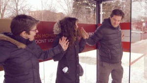 Bus shelter heats up when everyone holds hands