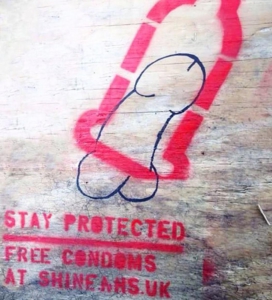 Stay protected: Putting condoms on Penis Graffiti