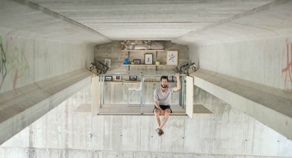 A hidden workspace under a concrete bridge